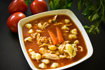 Polish tomato soup in white bowl