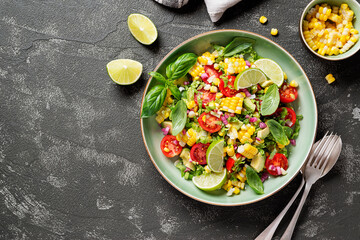 Colorful Corn Tomato Avocado Salad. Top view