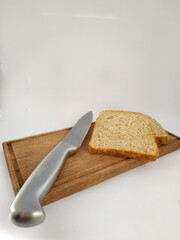 
slices of lactal bread cut by knife with a white background