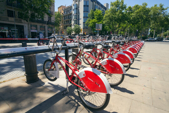 BARCELONA - MAY 21, 2016: Row of rental bikes from Vodafone Bicing is a self-service, bike-sharing scheme for short journeys.