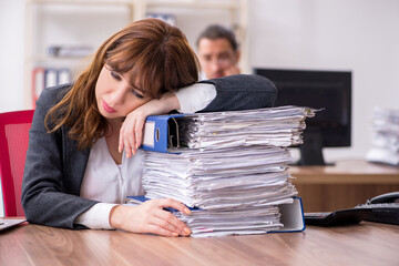 Two employees working in the office