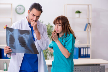 Fototapeta premium Two doctors colleagues working in the hospital