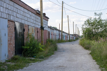 Fototapeta na wymiar Old garage cooperatives from the Soviet Union.
