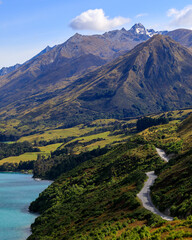 The road between Glenorchy and Queenstown next to Lake Wakatipu. From the view of Bennetts Bluff Lookout towards the mountains.