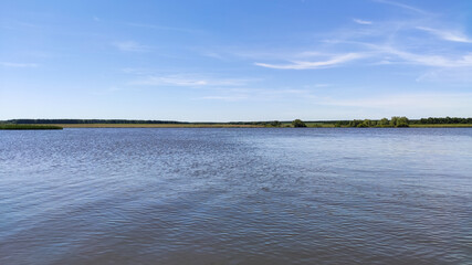 Ufa, Russia June 20, 2020 view of the reservoir on a sunny evening with clouds