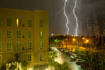 Thunderstorms from a hotel room in the west of Florida. Visible noise due to high ISO