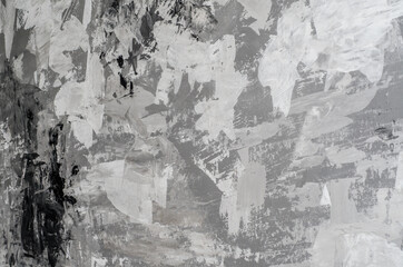 Naklejka premium Background of wall is painted with white and gray paints, chaotic painting with facade paints, trash background.