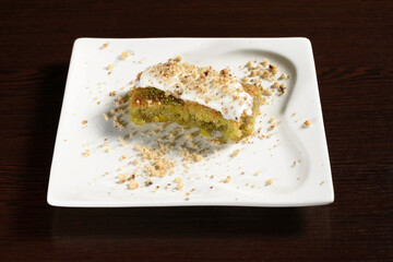 The sweetness of Turkish pistachio honey baklava with ice cream. Photos for restaurant and cafe menus