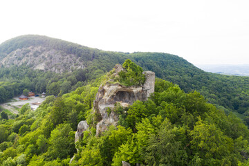 Fototapeta na wymiar Old fortress on the top of the rocks in Romania.