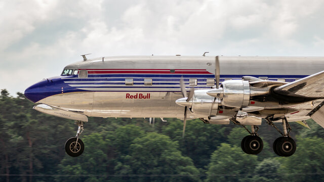 BERLIN, GERMANY - JUNE 2, 2016: Douglas DC-6B vintage plane from The Flying Bulls landing on Berlin-Shonefeld airport during the ILA AIrshow.