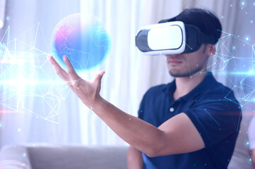 man in vr glasses, watching 360 degree video World map with virtual reality headset at home