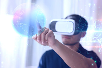 man in vr glasses, watching 360 degree video World map with virtual reality headset at home