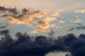 Fototapeta na wymiar Dark clouds, blue sky. Natural background.