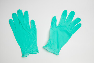 green rubber glove isolated on white background