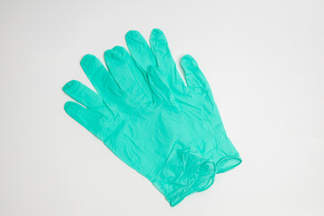 green rubber glove isolated on white background