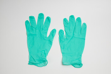 green rubber glove isolated on white background