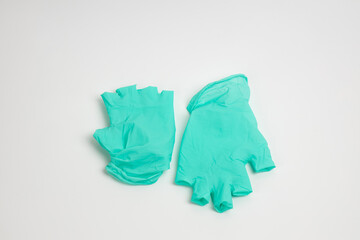 green rubber glove isolated on white background