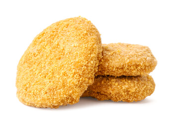 Cutlets, nuggets close-up on a white. Isolated