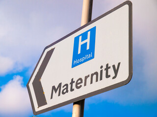 Sign showing direction of the maternity wing of an NHS hospital