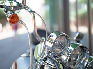 closeup of the headlights and direction indicators of a big bikes