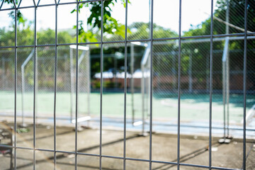 Close-up chain link fence , Sunset background
