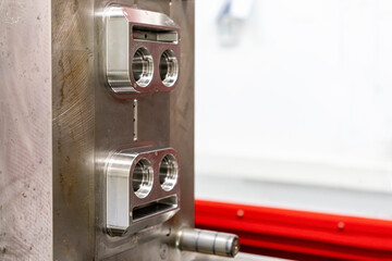 metal mold or plastic injection mold setup on high pressure injection machine for mass production or manufacturing in industrial