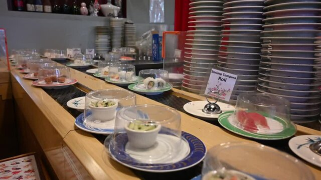 Tempe AZ USA 07/18/2020 Sushi on a conveyor belt  