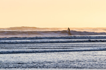 Surfing in the Oregon coast