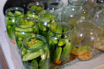 Canned pickled cucumbers in jars. Homemade food