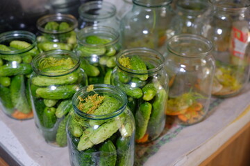 Canned pickled cucumbers in jars. Homemade food