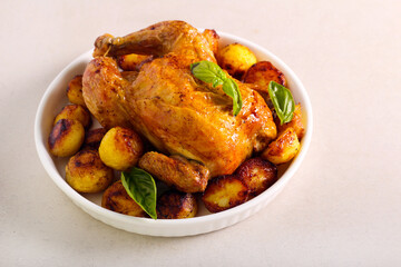 Roast chicken and potatoes