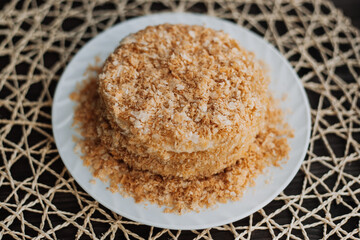 
homemade layer cake with crumb on textured background