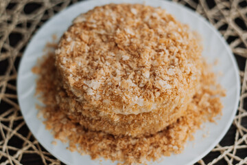 
homemade layer cake with crumb on textured background