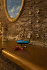 wooden boat stands on the table