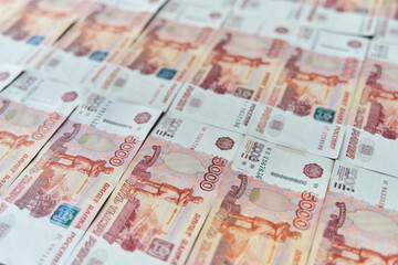 Money on Russia. Close-up of Russian rubles on five thousand and one thousand banknotes. Finance concept. High quality photo
