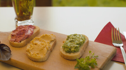Three bruschetta with vegetable pate