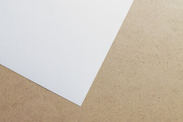 Close-up of a sheet of white paper for drawing on a sketchbook board.