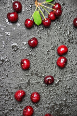 Fresh cherries on black background