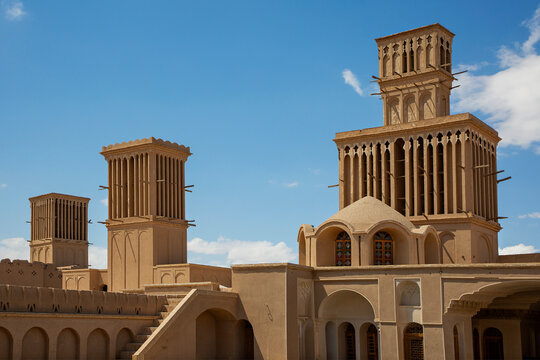 Historical house with wind towers known also as wind catchers, in Abarkuh, Iran
