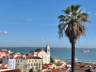 view of ocean and alfama in lisbon