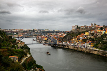 Fototapeta na wymiar Portugal, Porto - January 2020. Top view of the old streets of the city of Porto and the Duoro river.