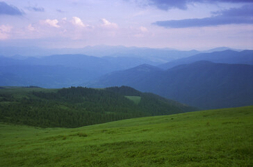 Fototapeta premium Sunset in the cloudy mountains of the Carpathians
