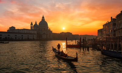 Beautiful sunrise over the canale grande in Venice, italy with the Santa Maria in the background