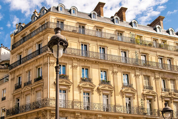 Fototapeta na wymiar Paris, typical facades and street, beautiful ancient buildings place Saint-Georges 