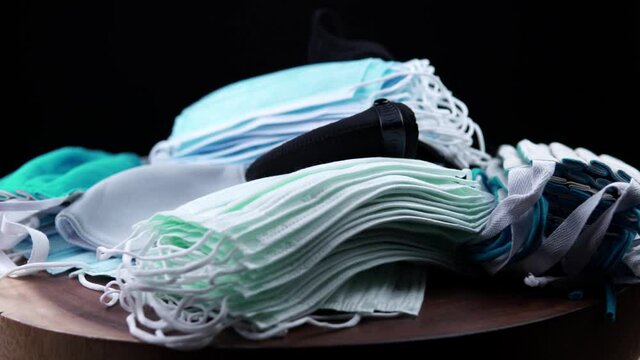 Non reusable and washable medical and dust face masks, PPE personal protective equipment for reuse due the price gouging. Covid-19 coronavirus pandemic. Disinfection and sterilization. New normal.
