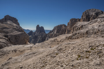 Pale di San Martino mountain group summits from L to R,  Cima Canali, Cimerlo, Sass Maor, Cima della Madonna, as seen from Pradidali Basso pass, at the foot of Fradusta glacier, Dolomites, Italy.