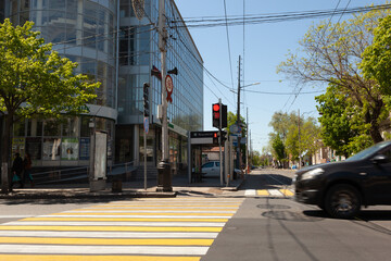  Pedestrian crossing traffic signal with timer and traffic lights at the intersection allow...