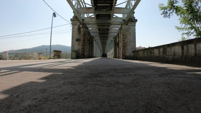Tui / Spain - July 8, 2020: Valen&ccedil;a Road-Railway Bridge, also known as Ponte Internacional de Tui, is a road and rail bridge, crossing the Minho River on the border between Portugal and Spain.