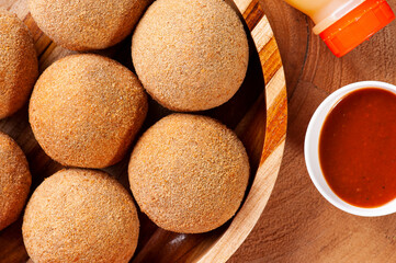.Fried meat balls. Typical Brazilian bar snacks. Made of ground meat, breaded and fried. Top view