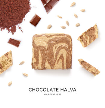 Creative layout made of sunflower halva and cacao on white background. Flat lay. Food concept.